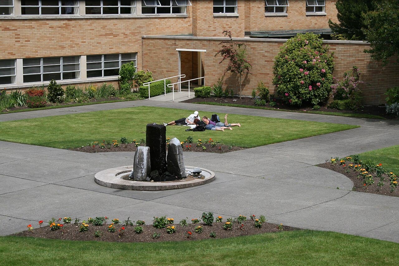 Students studying on the lawn at Bastyr University campus
